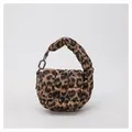 Detail view of leopard print quilted mini cloud bag with silver metal ring and button - One Size / Leopard Brown