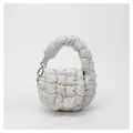 Macro detail of off-white quilted cloud bag featuring soft texture and silver hardware - One Size / Gray