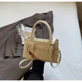 Schicke cremefarbene Handtasche mit Schnallendetail und Gurt im Minimal-Stil - Einheitsgröße / Gebrochenes Weiß