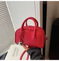Red lychee pattern leather boston bag with top handles and silver spherical charm - One Size / Red