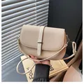 Chic cream white saddle crossbody bag with fine woven texture and silver metal trim - White / One Size