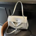 Minimalist silver metallic leather shoulder bag with top handle and twist lock closure - Large / Beige White Large