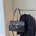 Classic black leather underarm bag with silver twist lock and dual shoulder straps - Large / Black Large