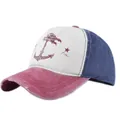 Detail of distressed brim and anchor print on a vintage-style patchwork baseball cap - Burgundy