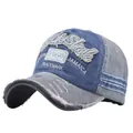 Close-up of vintage washed cotton baseball cap with 3D embroidery and distressed edges - Grey & Navy Blue