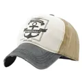 Detail of vintage anchor print and distressed frayed edges on a nautical baseball cap - Adjustable / Black + Khaki