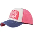 Detail of distressed brim and Motors Racing Team embroidery on vintage baseball cap - Navy and Watermelon Red