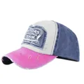 Detail view of distressed baseball cap with Motors Racing Team patch and frayed brim - Rose & Navy Blue