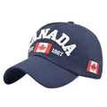 Detail showing white Canada embroidery and red maple leaf on navy cotton baseball cap - Adjustable / Navy Blue