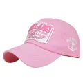Detail of pink cotton baseball cap featuring Oakland embroidery and anchor side patch - Adjustable / Pink