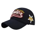Detailed close-up of 3D embroidery and star pattern on navy cotton baseball cap - Adjustable / Navy Blue