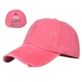 Close-up of pink distressed ponytail baseball cap with elastic criss-cross back detail - Adjustable / Red