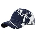 Detail of navy blue tie-dye baseball cap featuring abstract print and white stitching - Adjustable 54-59cm / Navy Splatter (3)