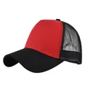 Detail of red and black mesh trucker hat showing breathable texture and curved visor - Adjustable / Red and Black