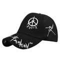 Close-up of graffiti prints and fashion lettering on black cotton baseball cap - Black