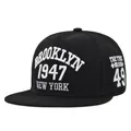 Close-up of premium 3D Brooklyn 1947 embroidery on a black flat brim baseball cap - Black Embroidered BROOKLYN (3 Black)