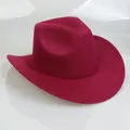 Macro detail of dark red wool felt western cowboy hat with wide brim and curved edge - 54cm / Burgundy