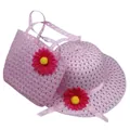 Detail of pink woven straw sun hat and matching handbag with artificial daisy flowers - Hat Circumference 52cm / Pink