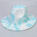 Close-up of blue and white tie-dye wool fedora hat with a wide brim and textured finish - Sky Blue + White