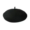 Detailopname van de zwarte wollen baret met focus op de stof en de bovenkant - Omtrek 50-52cm / Zwart