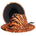 Detail view of orange tiger print fedora hat with gold chain and black tassel accent - M (56-58cm) / Orange Tiger Exterior Black Lining