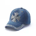 Detail of rhinestone cross patch and studded brim on blue denim baseball cap - Blue Rhinestone Cross