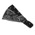 Detail of black paisley yoga headband featuring elastic band and soft vintage fabric - Black