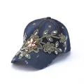 Detail of dark blue denim baseball cap with gold flower embroidery and sparkling rhinestones - Dark Blue Gold Embroidered Floral