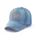 Light blue denim baseball cap featuring a sparkling rhinestone butterfly and studded brim design - Light Blue Colorful Butterfly