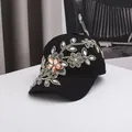 Casquette de baseball noire avec broderie florale et accents de strass étincelants - 56-60cm / Broderie Florale Noire