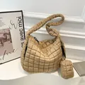Quilted khaki puffer tote bag with a matching mini charm pouch and wide shoulder strap - Khaki