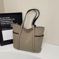 Minimalist khaki canvas tote bag with multi-pockets and black straps for daily casual use - One Size / Gray