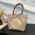 Beige waterproof nylon tote bag with brown leather handles and large capacity - Khaki