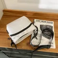 Off-white nylon crossbody bag with black zippers and adjustable wide strap - White