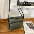 Olive green nylon crossbody bag with dual zipper compartments and black strap - Green