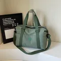 Bean green multipurpose travel bag with durable nylon fabric and detachable shoulder strap - Green