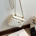 White quilted vanity bag with golden camellia motif and chain shoulder strap - Large / White
