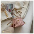 Pink quilted leather vanity case bag with gold chain strap and camellia metal charm - Large / Pink