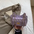 Elegant light purple quilted shoulder bag with gold chain strap and classic turn-lock - One Size / Purple