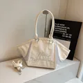 Borsa tote in nylon beige con ricamo blu e tracolla regolabile per variante - Taglia unica / Bianco Sporco
