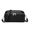 Black litchi-grain leather crossbody bag with silver zippers on a white background - Black