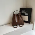 Sac à dos seau en similicuir marron foncé avec cordon de serrage et style vintage - Taille unique / Marron