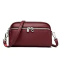Deep red lychee grain leather crossbody bag with multiple layers and silver hardware - Fuschia