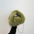 Moss green faux fur bucket bag with a knotted handle and silver chain strap - One Size / Green