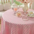 Close-up of pink and white checkered tablecloth with elegant ruffled edge and soft texture - Ruffle Style / 90cmx90cm / Pink Plaid