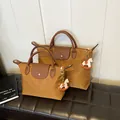 Brown nylon tote bags in two sizes with leather handles and rocking horse charms - Small With Charm / Dark Brown