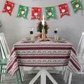 Detailweergave van rood kersttafelkleed met witte rendier- en sneeuwvlokmotieven - Wijnrode Streep Rendier