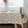 Detailed view of the linen tablecloth featuring green leaf patterns and lace trim edges - 140x250CM / Olive Leaf With Lace Edge