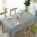 Detailed view of grey and white herringbone pattern tablecloth in a modern Nordic dining setting - 60*60cm / Grey Arrow