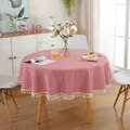 Detail of red and white checkered round tablecloth with decorative white pom-pom tassels - Red Fine Check